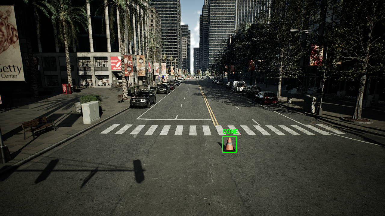 Rendered city street where the trained detector has boxed and labelled a single small cone far down the road